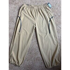 Under Armour Unstoppable Over Sized Womens Wind Pants NWT Large Tan MSRP $100